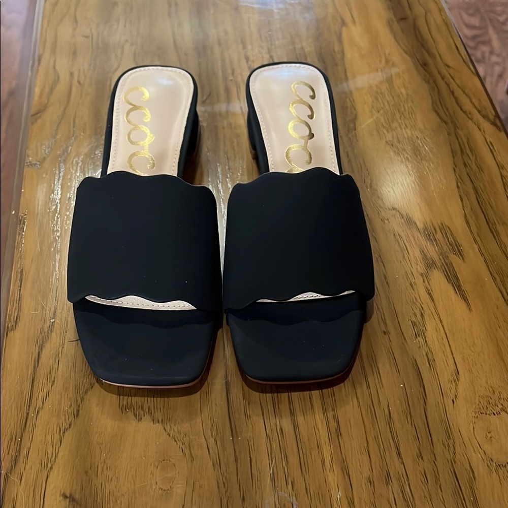 Brand new, Ccocci Women's Black Sandals, scalloped edge, size 6.5